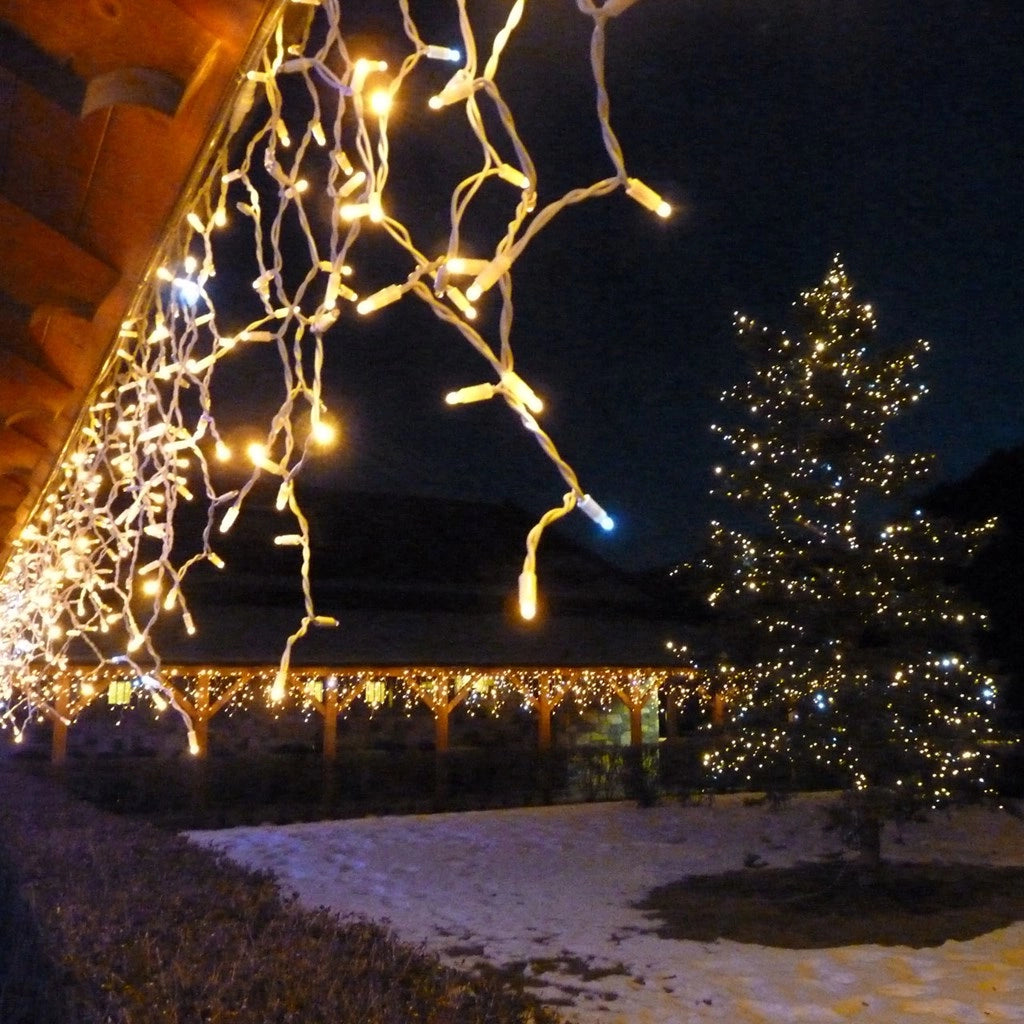 Tenda luminosa natale con 380 LED da 10mt prolungabile a luce calda fissa con flash bianchi intermittente per balcone facciate