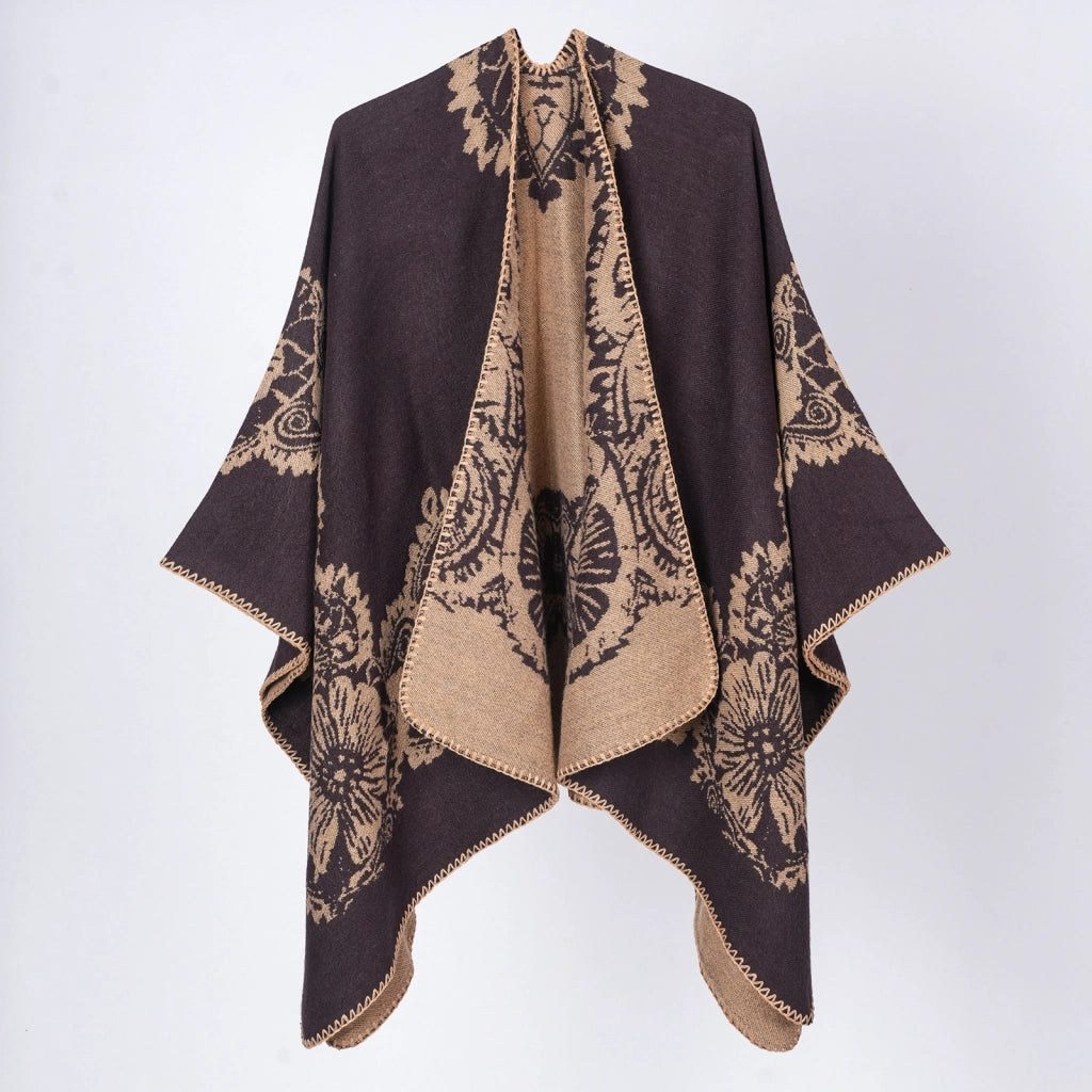 Mantella/cappa con cappuccio e spacco, d'ispirazione retr¨°: comoda, calda e versatile.