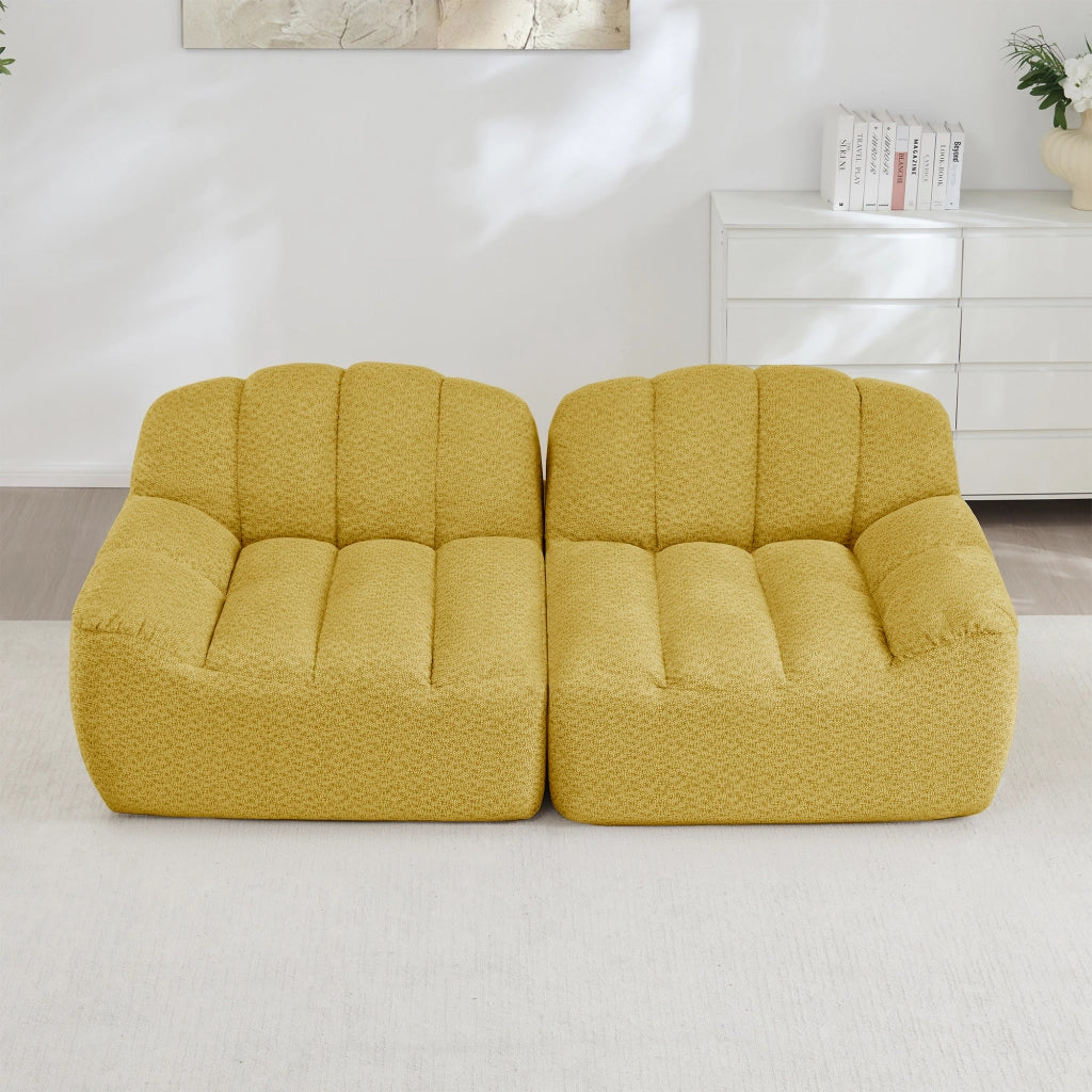 Divano modulare senza struttura con seduta ergonomica e cuscini profondi per soggiorno in pile granulato giallo