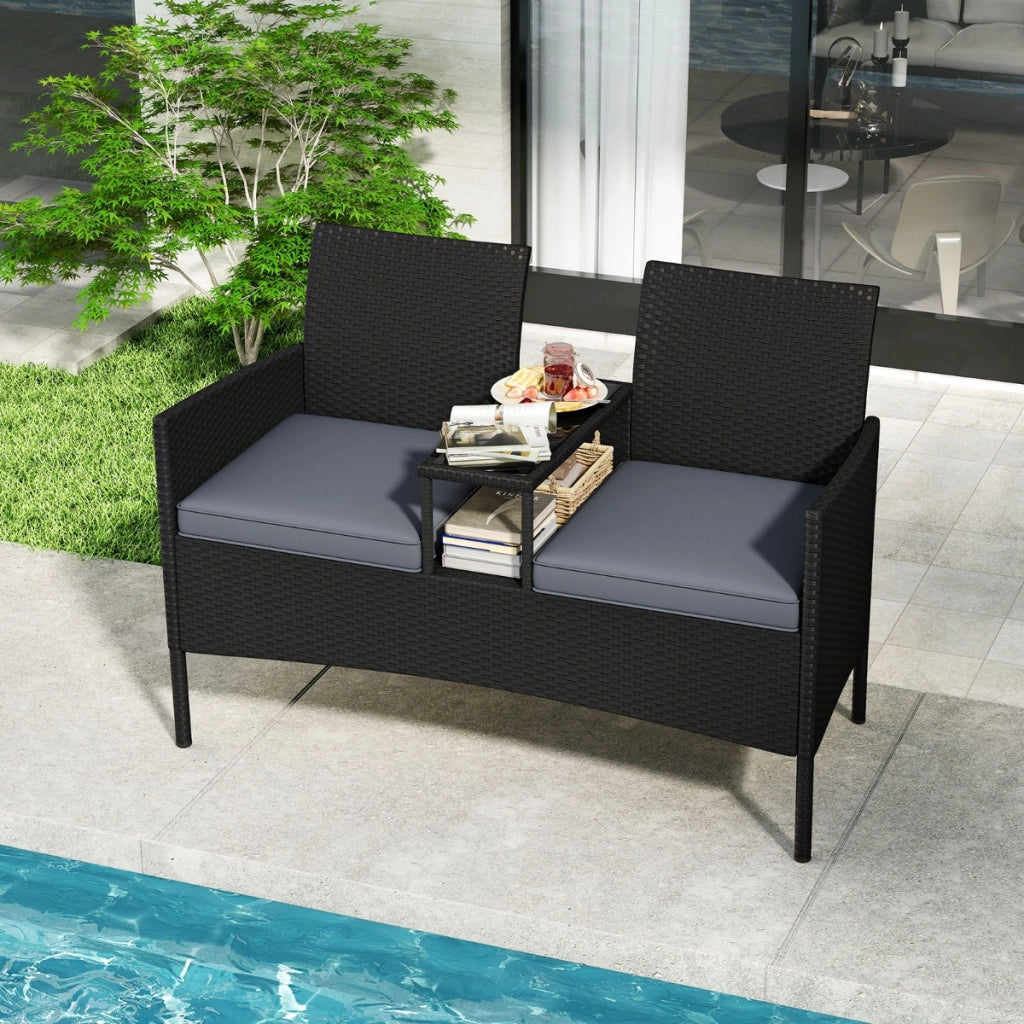 Divano da esterno con tavolino integrato, Mobile in rattan per 2 persone con cuscini e piano in vetro temperato Nero-Set mobili da esterno