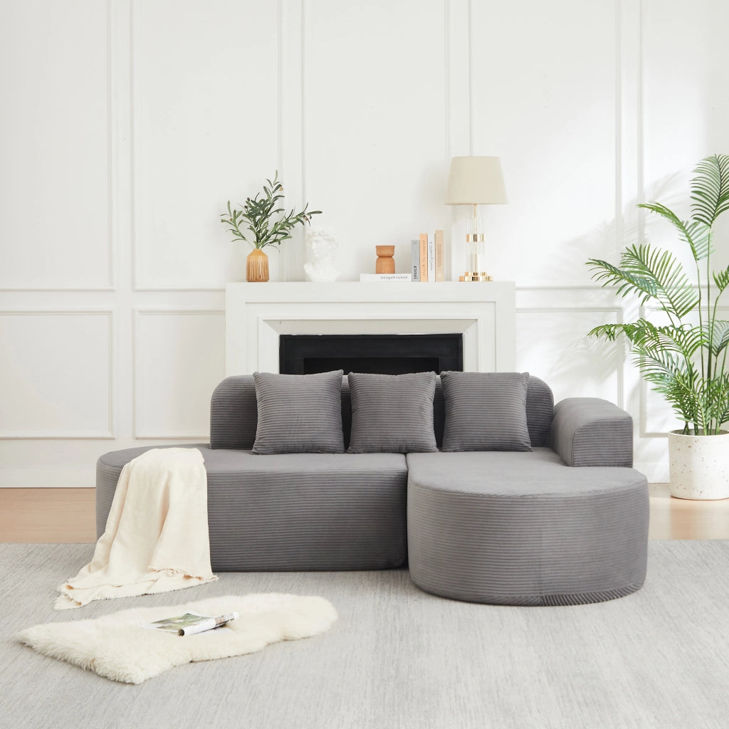 Divano angolare con chaise longue curva e 3 cuscini in velluto a coste grigio 220×155×70 cm