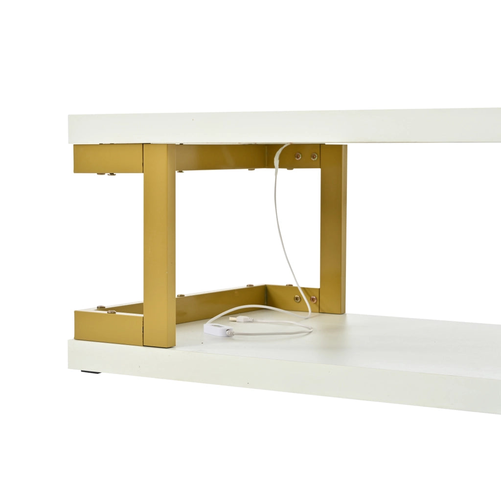 Tavolino basso con LED e 2 ripiani aperti per soggiorno e studio in MDF e metallo bianco e oro 100 × 50 × 37,5 cm