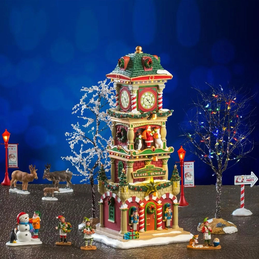 The Village Square Clock Tower Set - Torre con Orologio Villaggio Natalizio 15 pz con Personaggi e Alimentatore