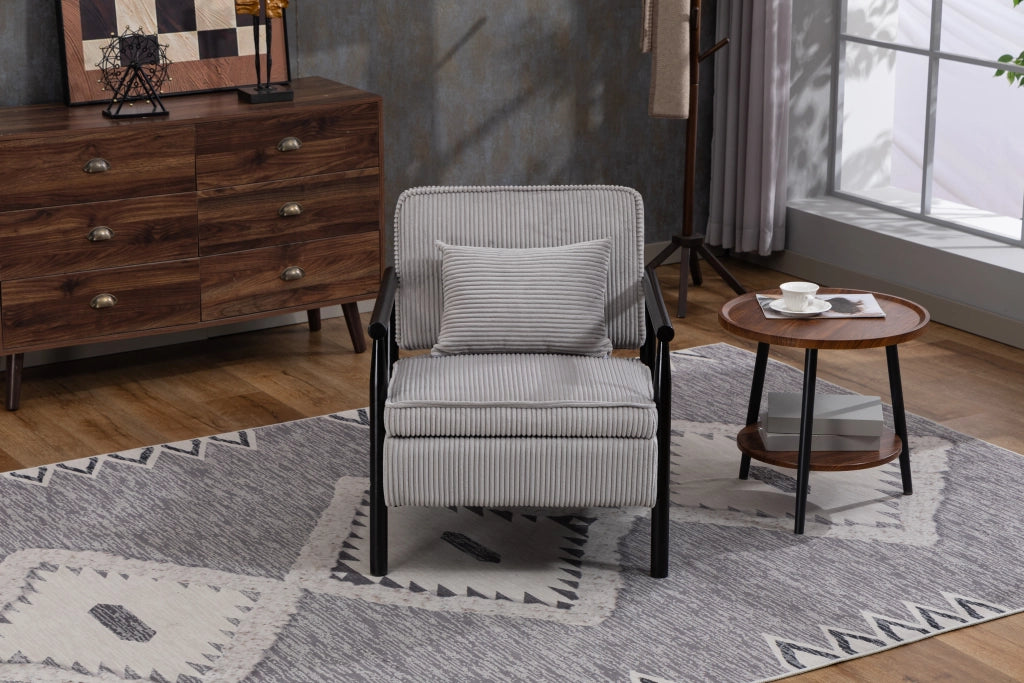 Poltrona contenitore in velluto grigio chiaro con struttura in legno e cuscino lombare
