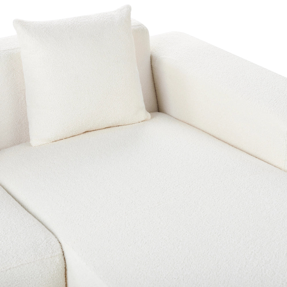 Divano angolare 4 posti in tessuto bouclè bianco lato sinistro forma a L stile elegante