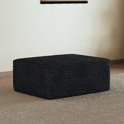 Pouf in tessuto effetto velluto a coste nero