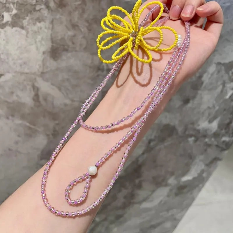 Collana con fiore di cristallo fatta a mano: gioiello con perline intrecciate