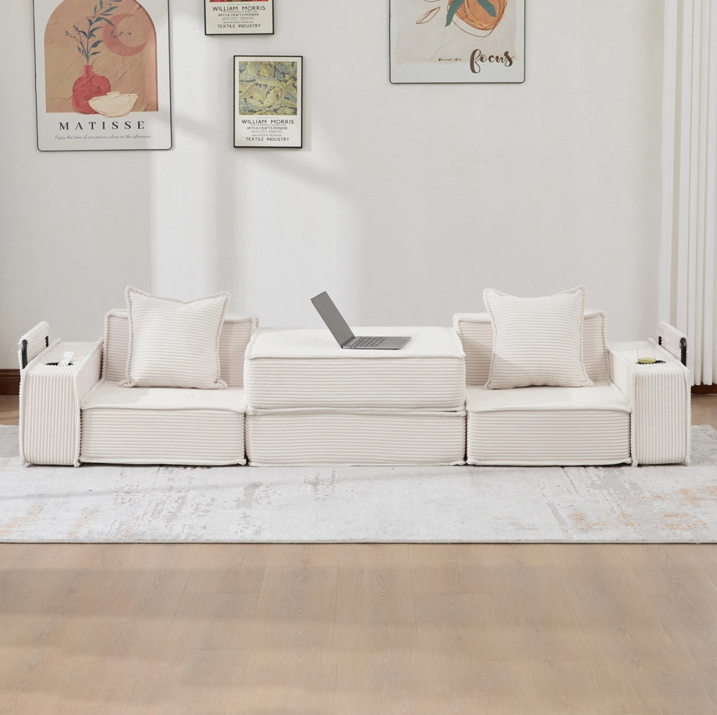 Pouf-sofà in velluto a coste beige con cuscini e tasche laterali