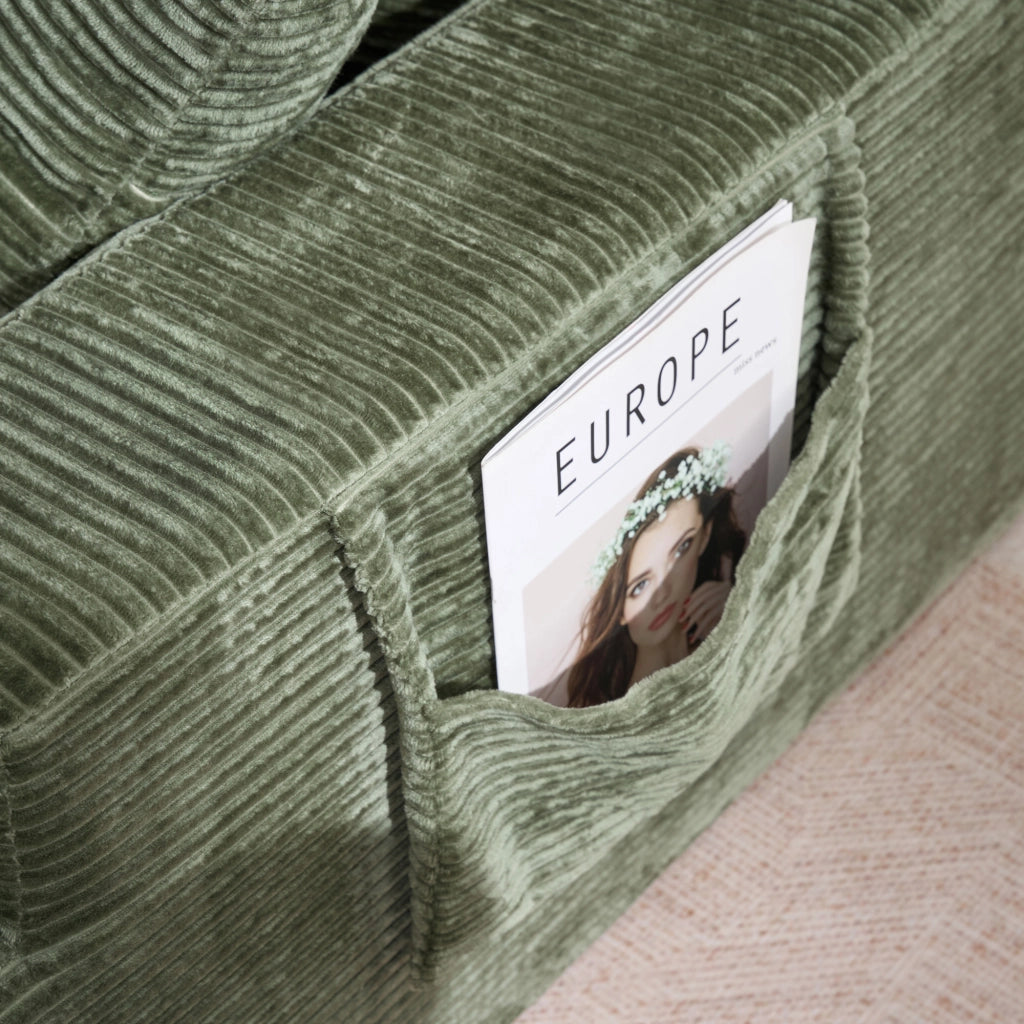 DIVANO in velluto a coste verde con tasche laterali e cuscini