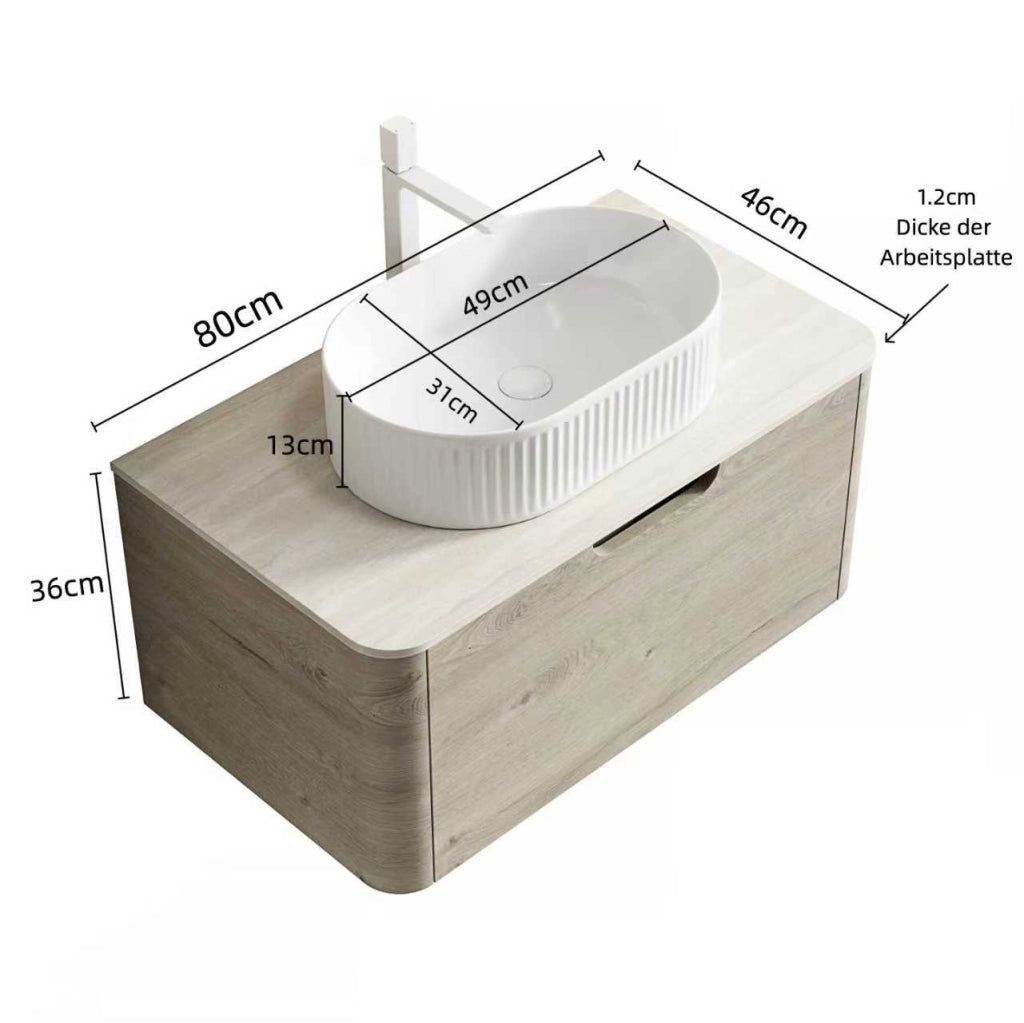 Mobile bagno sospeso con lavabo ovale in ceramica e 1 cassetto soft close; top in pietra sinterizzata per bagno