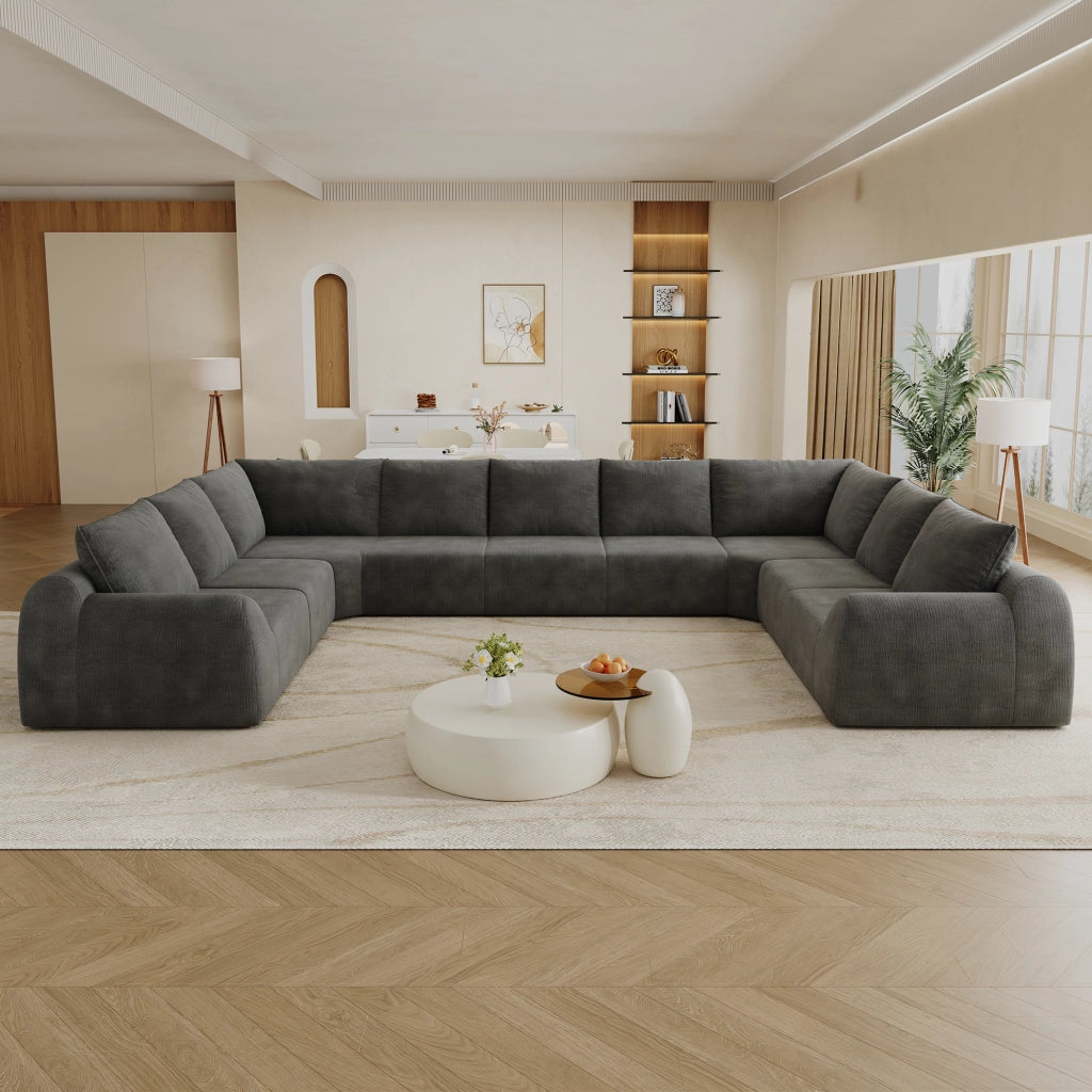 Divano a U 411x267x85 cm in tessuto chenille grigio scuro con imbottitura in foam