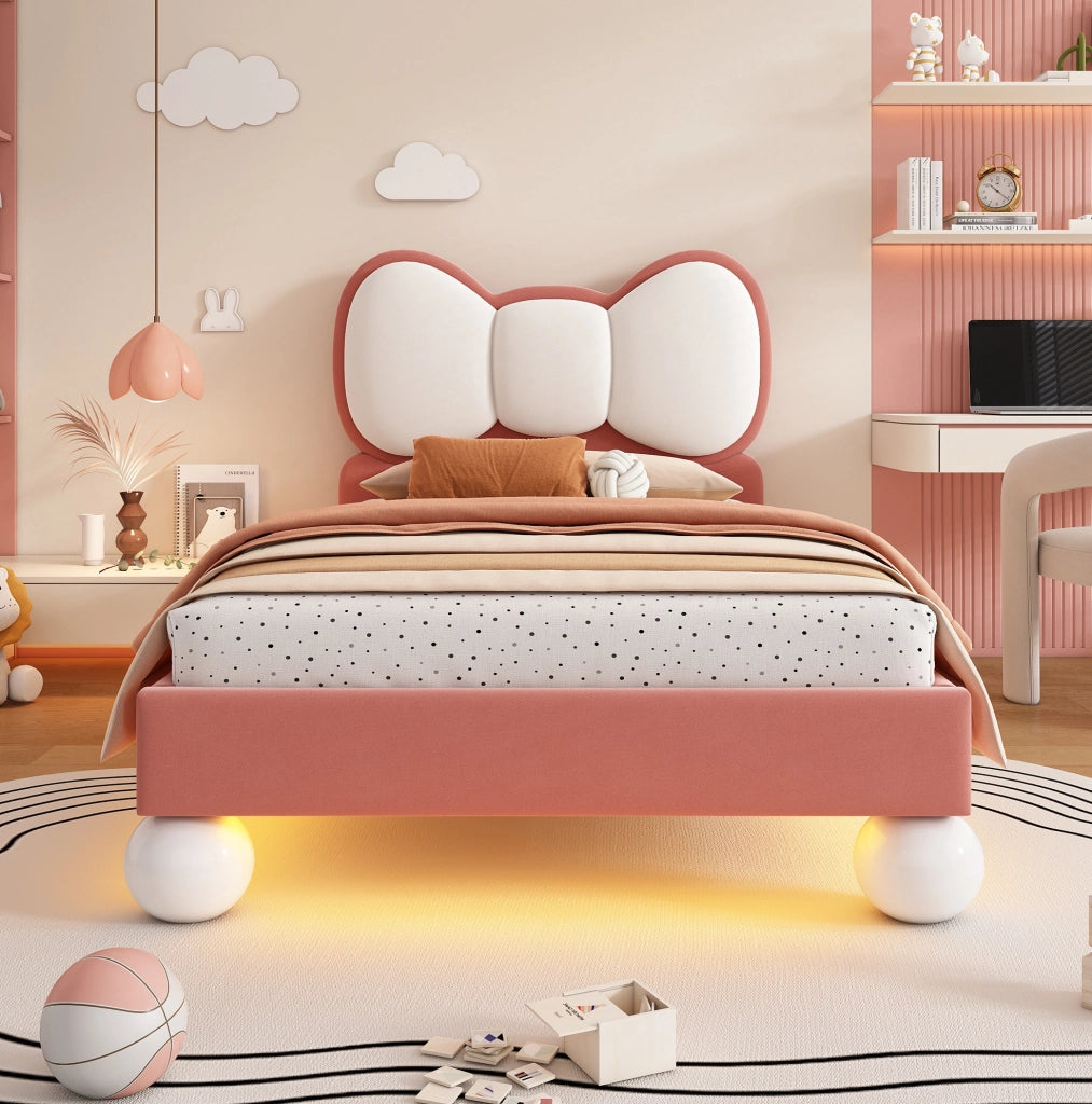 Letto imbottito per bambini 90x200 cm in velluto rosa con testiera a fiocco e LED