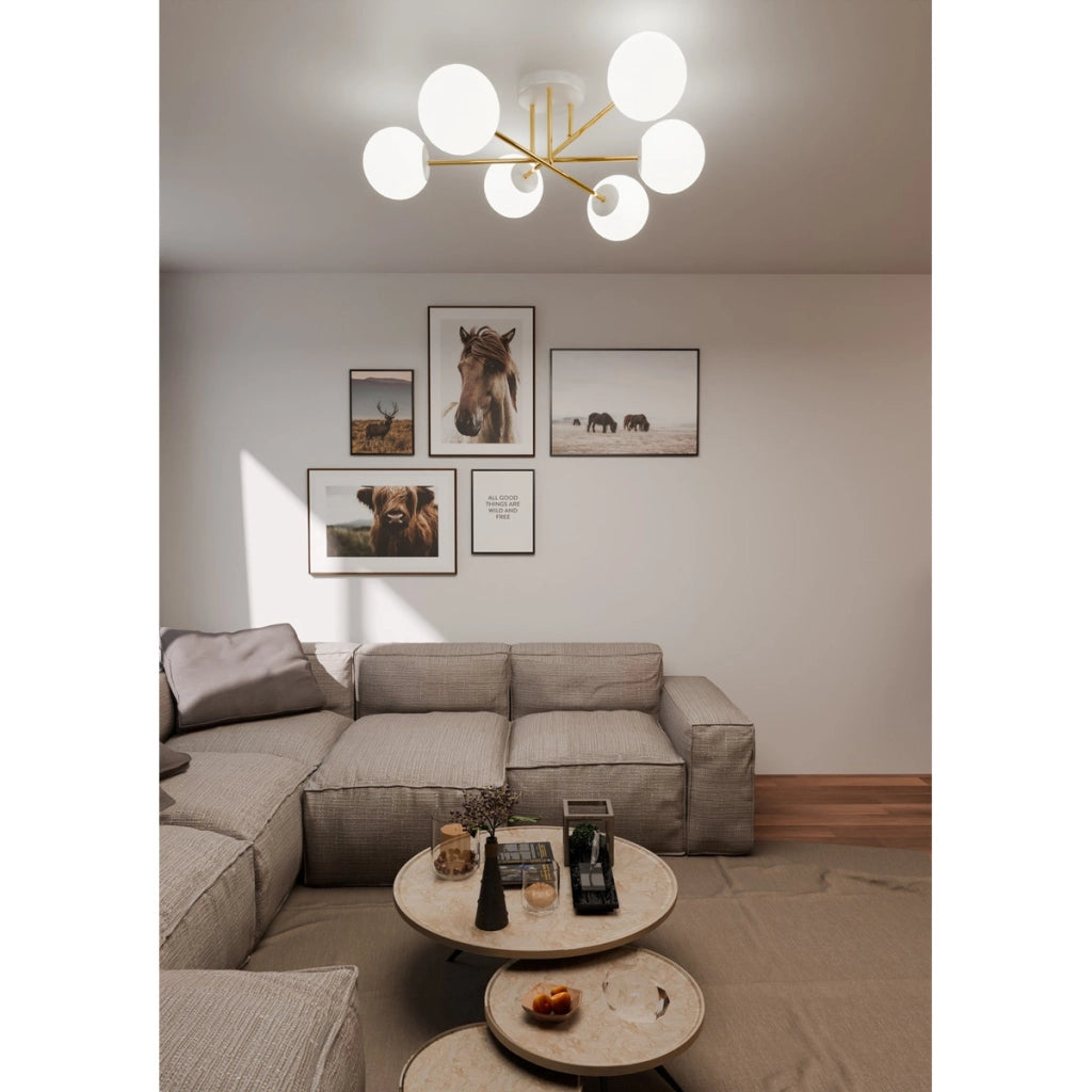 Lampada a sospensione Magnum con struttura oro e sfere in vetro