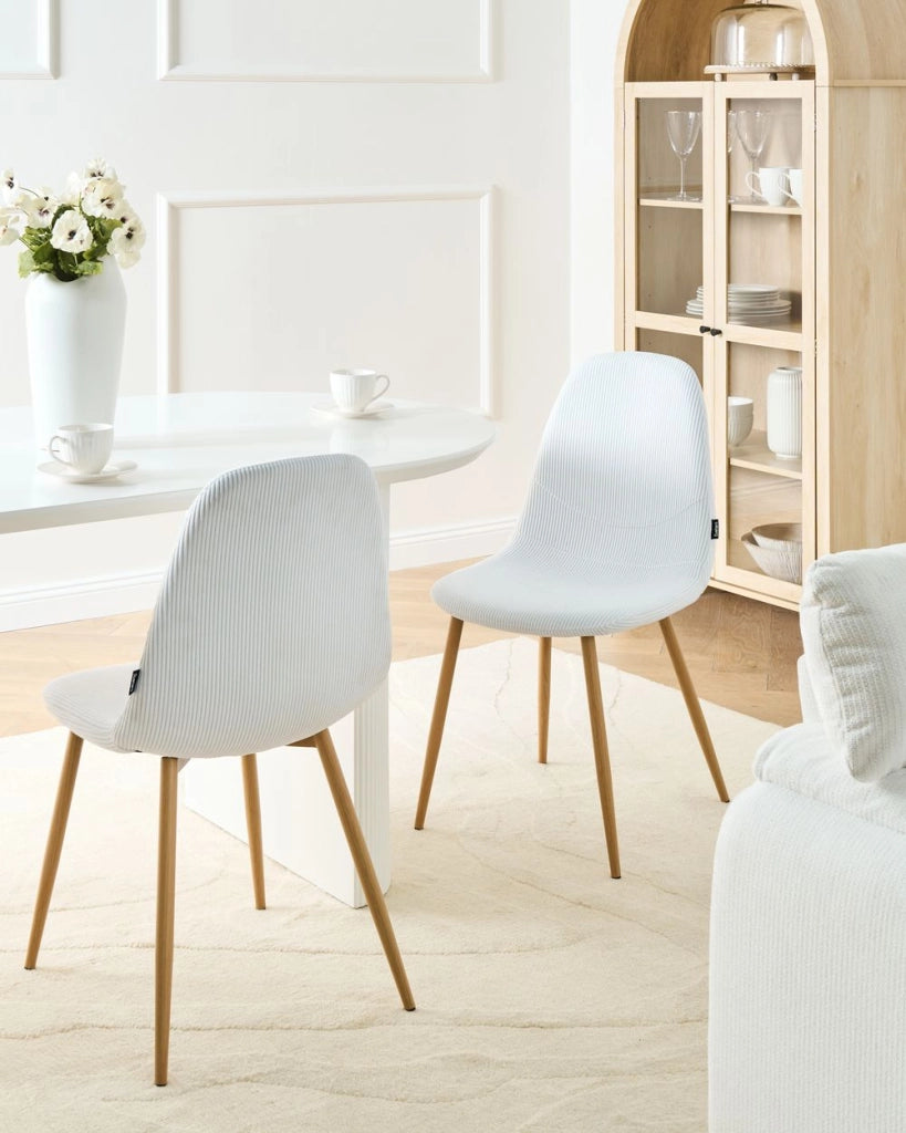 Set di 2 sedie da pranzo Struttura in tessuto bianco Seduta in velluto a coste Design moderno senza braccioli