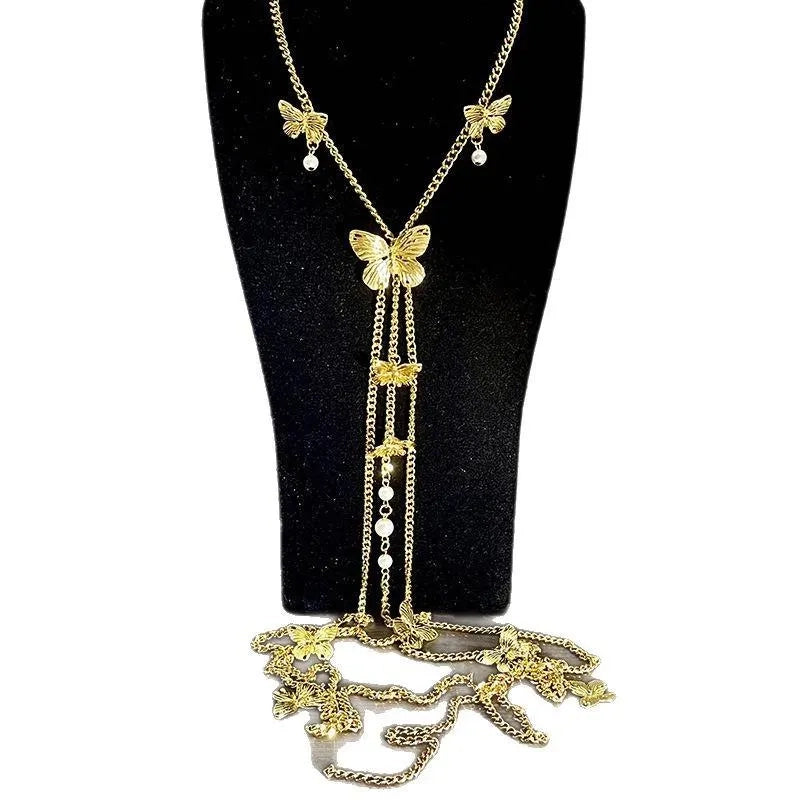 Collana fatta a mano con farfalla, nappa e perle, regalo di Natale o di compleanno.
