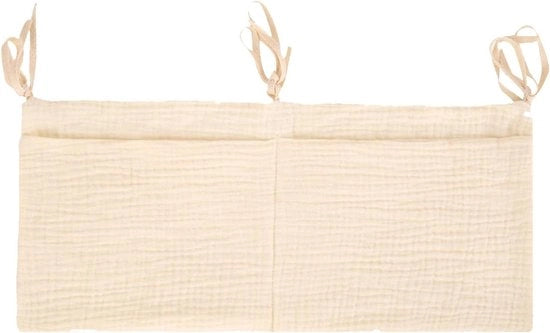 Organizzatore per lettini con contenitore per oggetti e coprisacco per bambini in beige.
