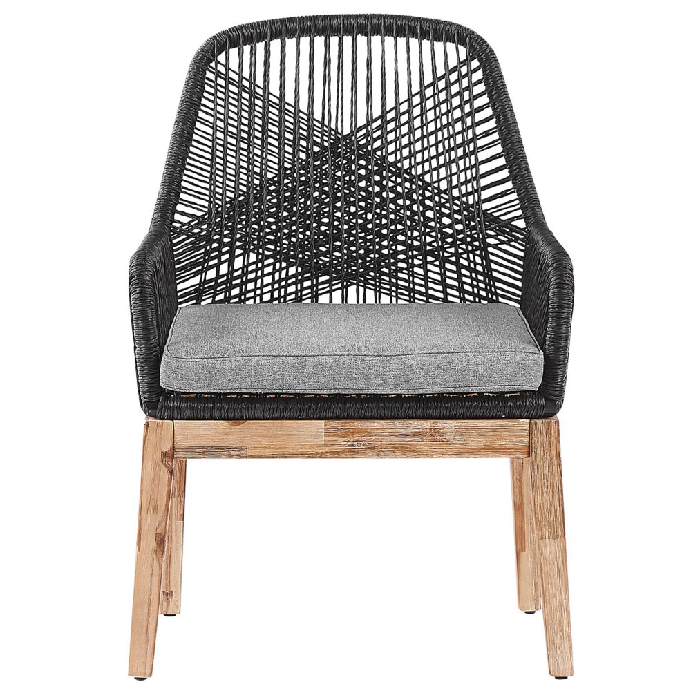 Set da esterno con tavolo in fibra di cemento grigio e 6 sedie in vimini stile moderno industriale