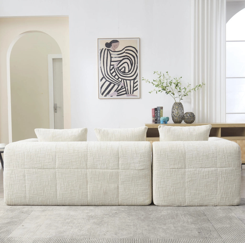 Divano modulare 3 posti in ciniglia beige con modulo allungato, tasche laterali e 3 cuscini