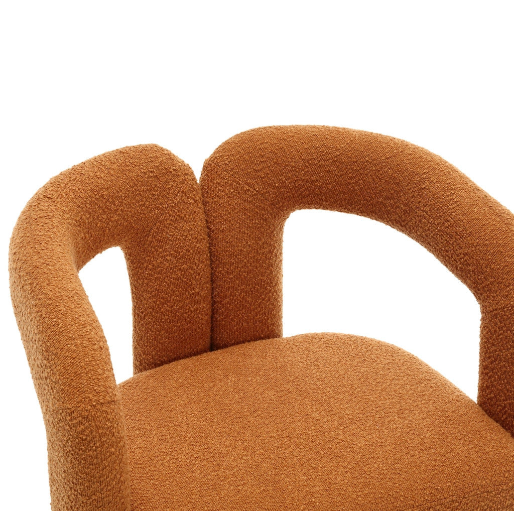 Poltrona girevole 360° in bouclé arancione; 67x55x74 cm; con base in metallo