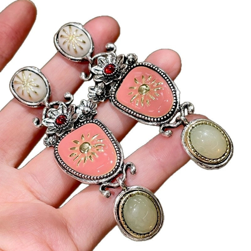 Orecchini a forma di fiore con smalto rosa, orecchini a tre strati con petali di cristallo in metallo.