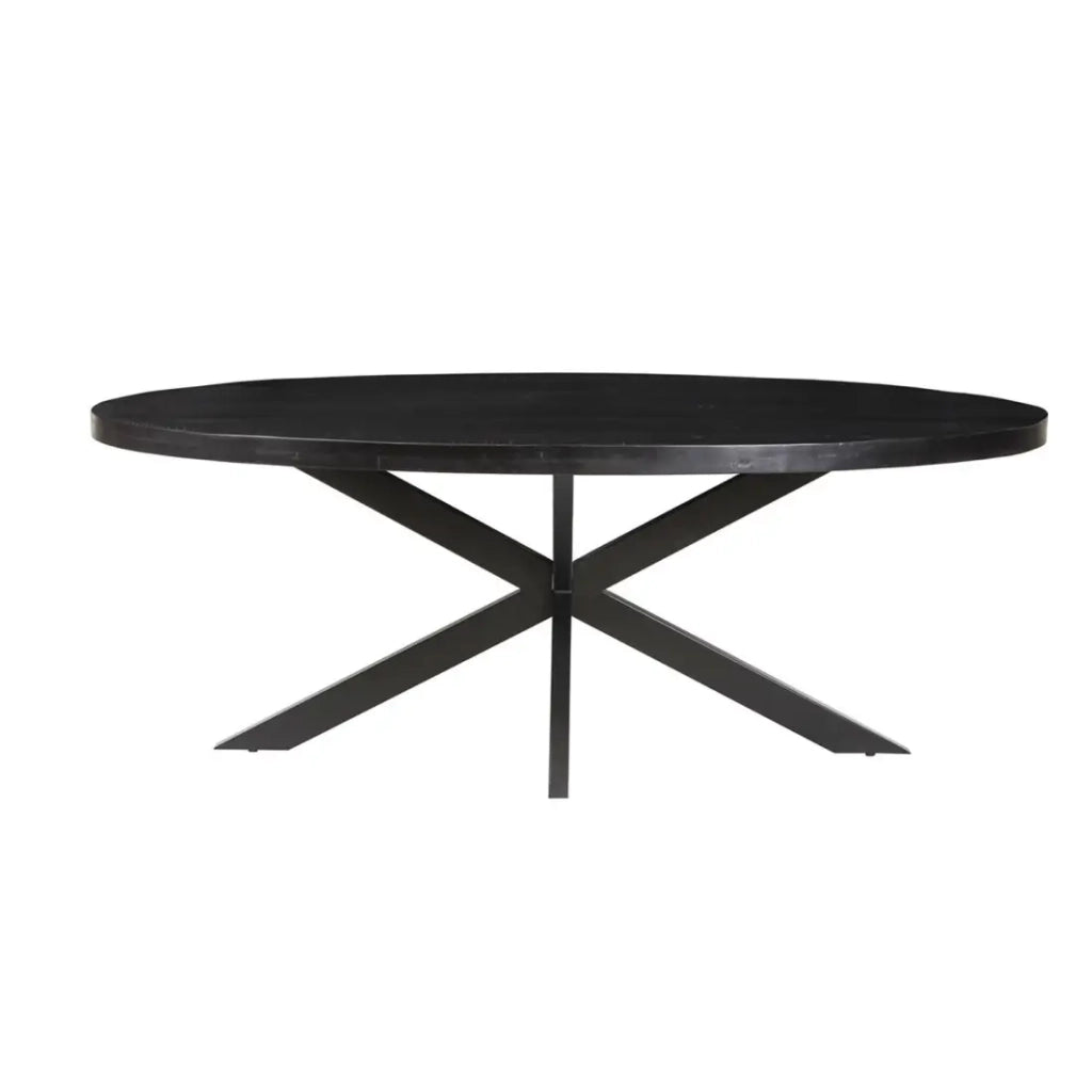 Tavolo da pranzo ovale BOURGIA in legno massiccio di Mangolia nero, ideale per una sala da pranzo accogliente.
