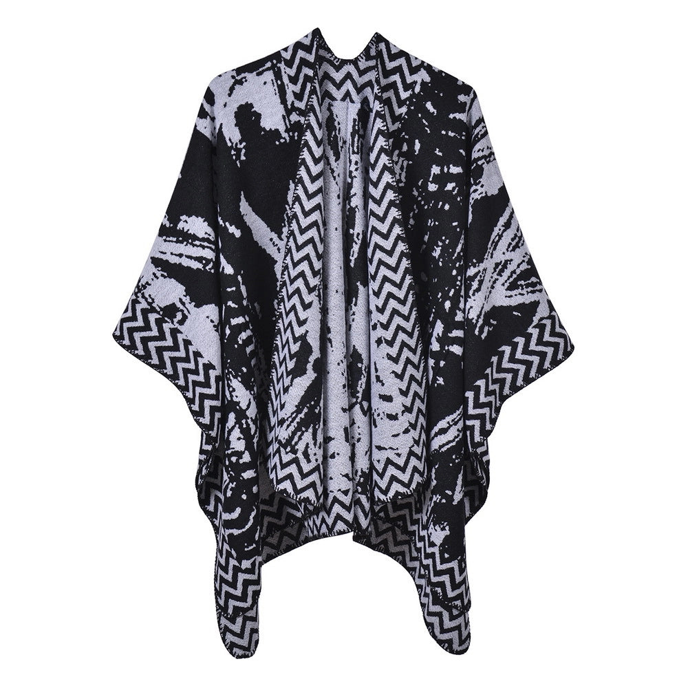 Elegante scialle/mantella oversize, spesso e caldo in cashmere con spacchi