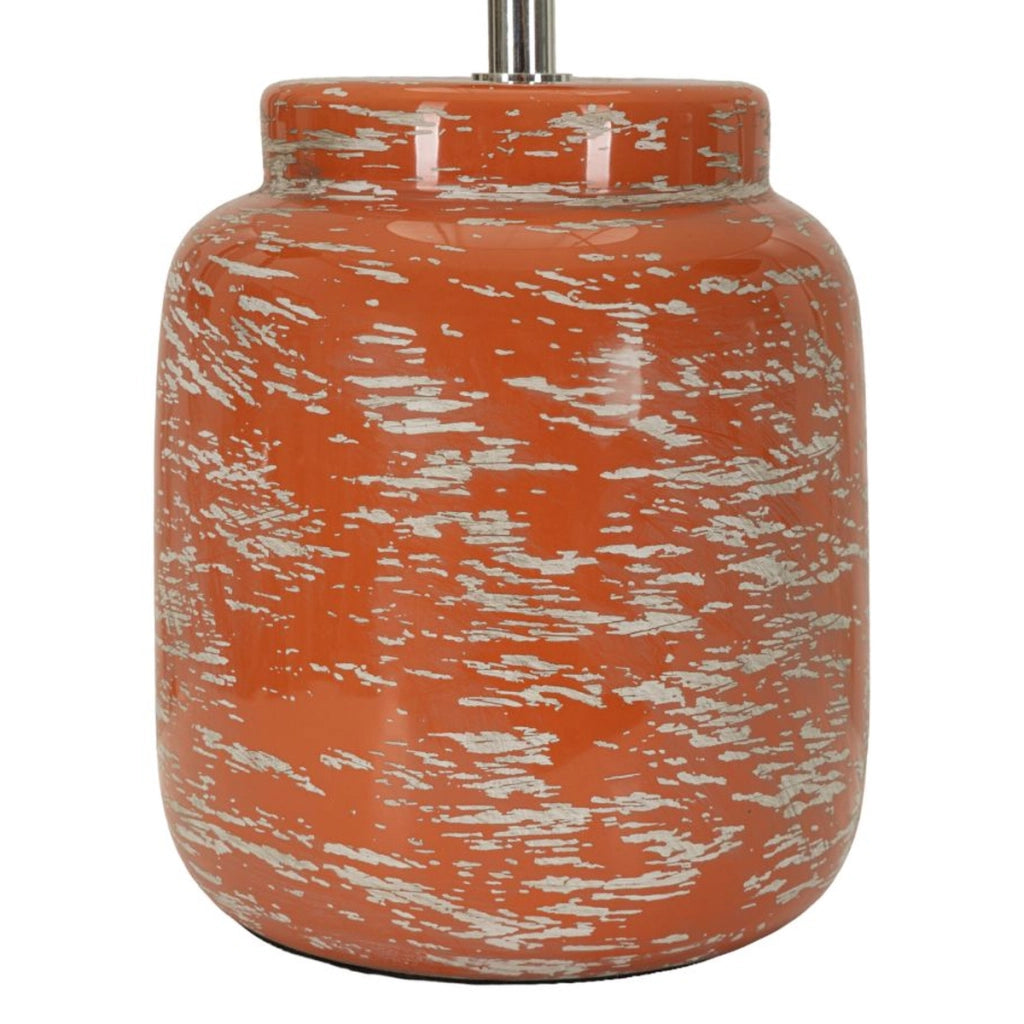 Lampada da tavolo con base in ceramica arancione e paralume in tessuto