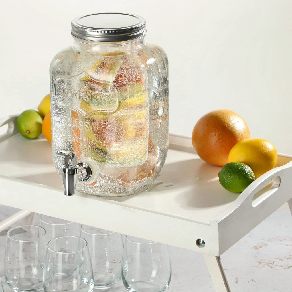 Barattolo KADAX con rubinetto da 4 litri in vetro con inserto per bevande come acqua, limonata e succo di frutta.