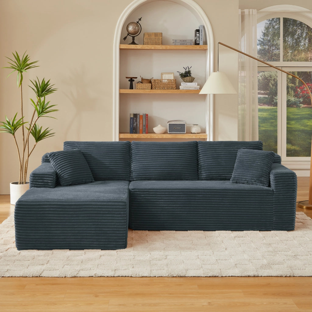 Divano modulare a L con 4 configurazioni in tessuto traspirante e cuscini collo grigio scuro 252,5 × 163 × 65 cm
