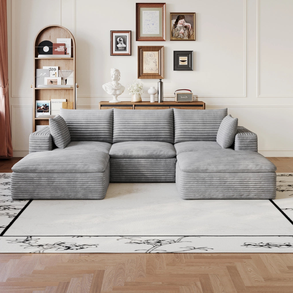 Divano modulare ULEVR in tessuto grigio con supporto interamente in schiuma e design configurabile