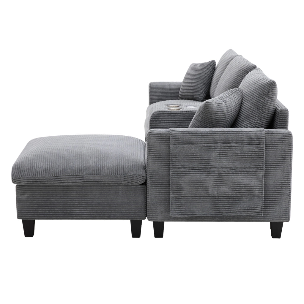 Divano angolare ULEVR 229x149,5 cm con pouf contenitore, console USB e 2 portabicchieri, velluto a coste grigio