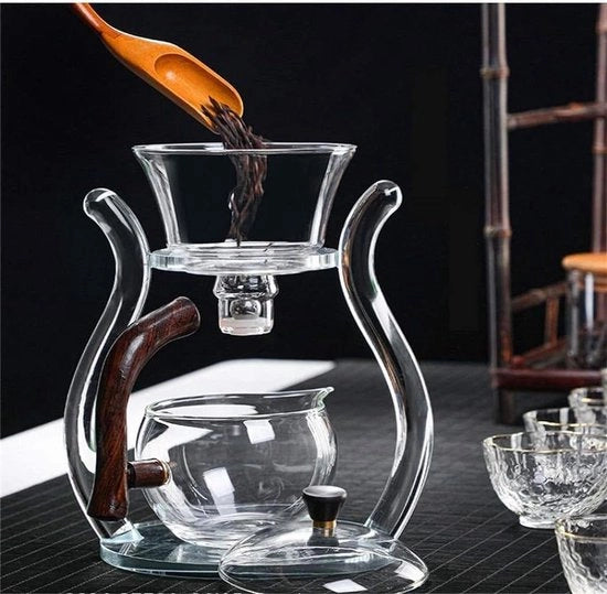Set di Tè Magnetico Rotante Resistente al Calore con Bollitore in Vetro e 6 Tazze