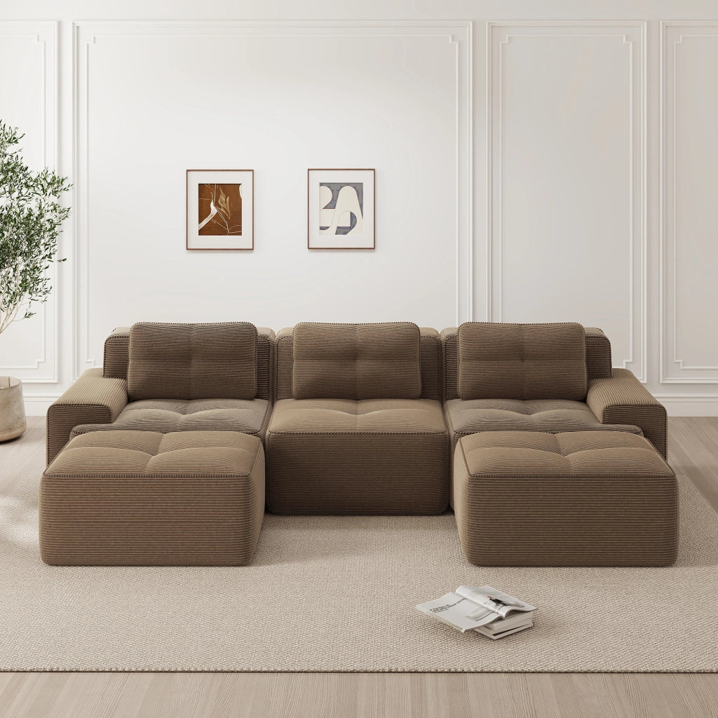 Divano modulare senza struttura con seduta profonda e design modulabile; in velluto a coste marrone