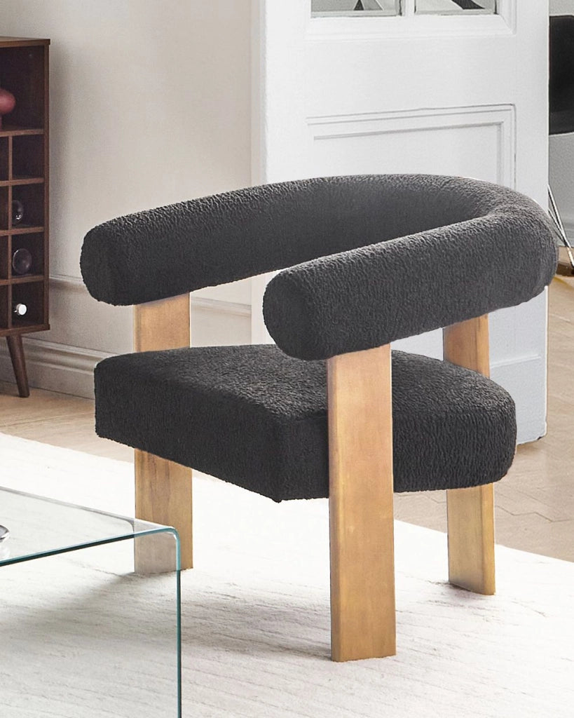 Poltrona nero e marrone chiaro con rivestimento in bouclé design retrò gambe in legno per soggiorno