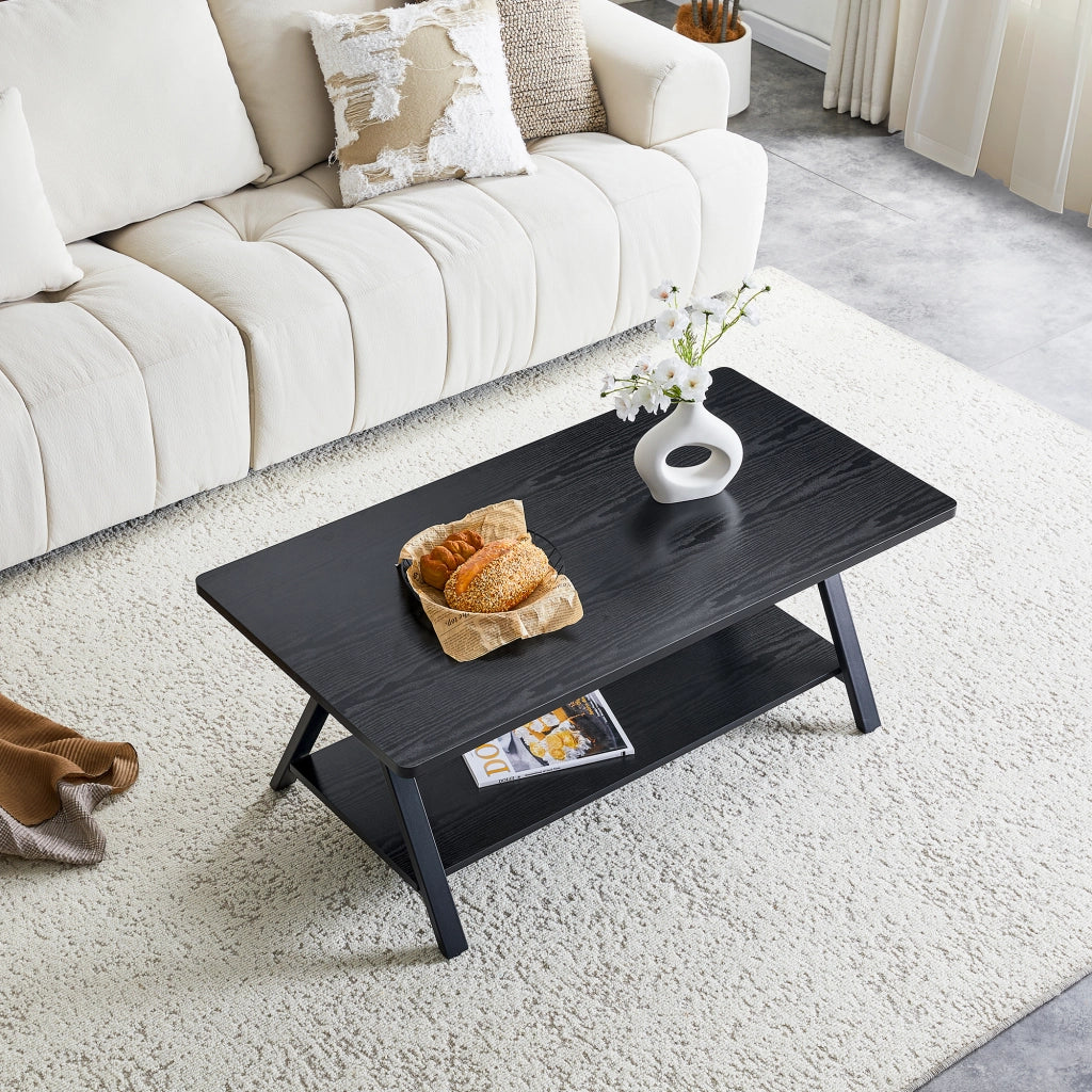 Tavolino basso con ripiano portaoggetti, effetto legno nero e struttura in metallo, per soggiorno, 110 × 57 × 44,5 cm