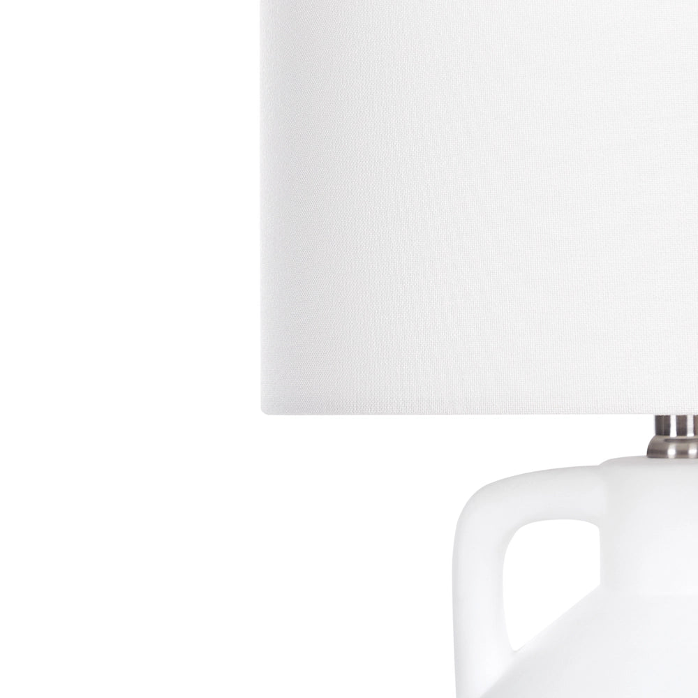 Lampada da tavolo in ceramica bianca con paralume a tamburo in lino base minimalista stile design contemporaneo