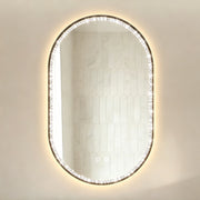 Specchio da bagno ovale con LED, funzione antiappannamento, luce regolabile e cornice nera con cristalli