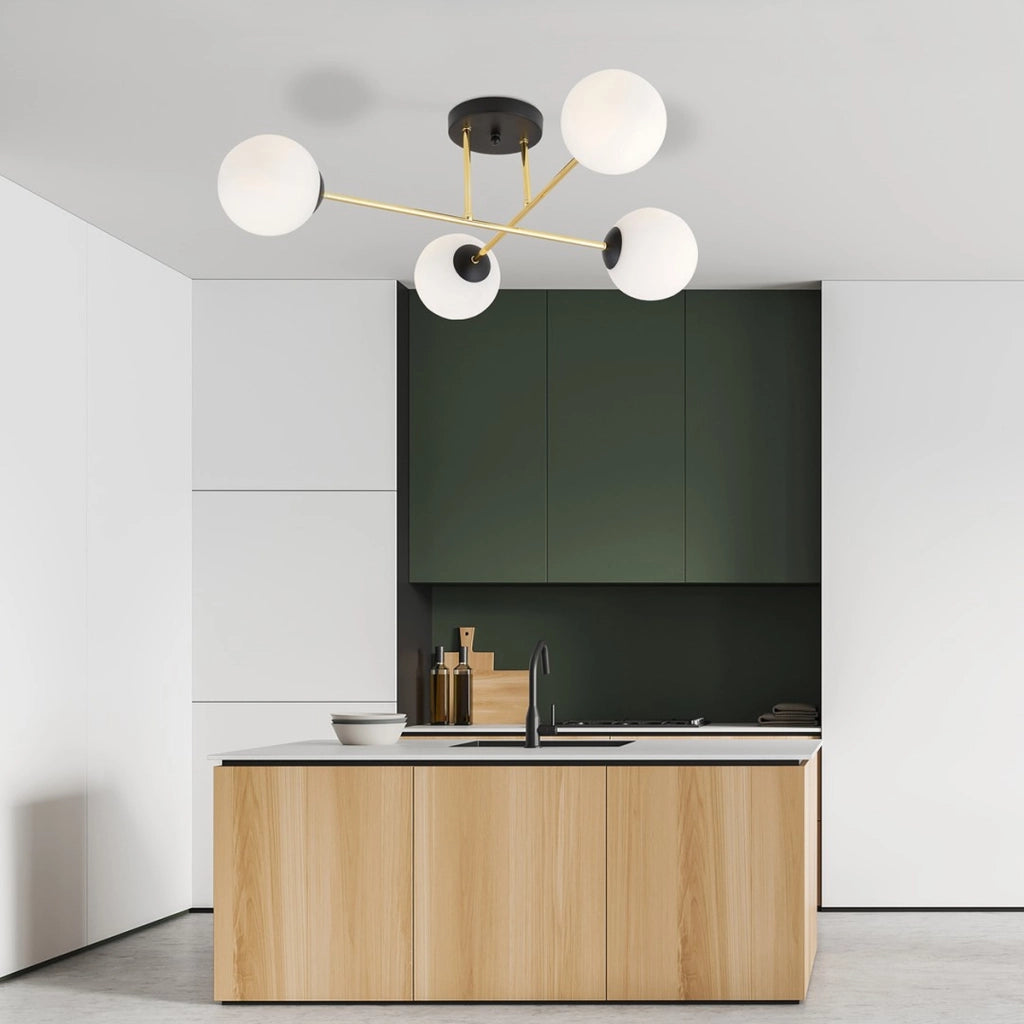 Lampada a sospensione Magnum con struttura in metallo nero e oro