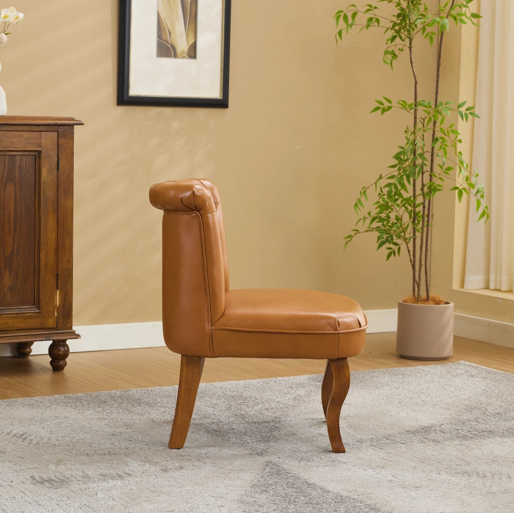Sedia da pranzo in pelle marrone chiaro con gambe in legno