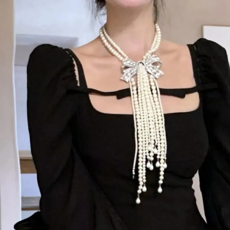 Collana con fiocco doppio strato e nappa di perle, realizzata a mano, regalo di Natale o di compleanno.