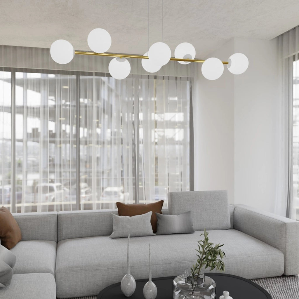 Lampada a sospensione Gravity con diffusori in vetro e dettagli oro