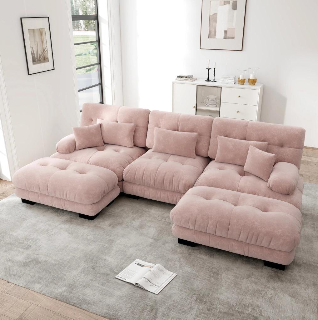 Divano modulare con ottomane mobili in chenille rosa; configurazione U o angolare