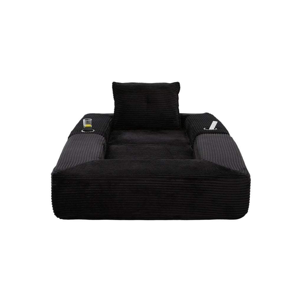 Divano convertibile in velluto a coste con molle, cuscini in memory foam, tasche laterali e portabicchieri nero