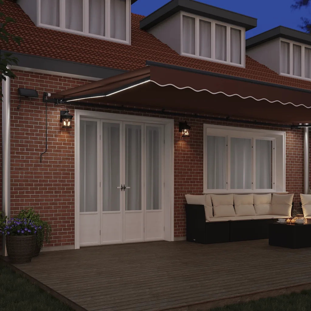 Tenda da Sole Retrattile Manuale con LED Marrone 600x300 cm 3310222