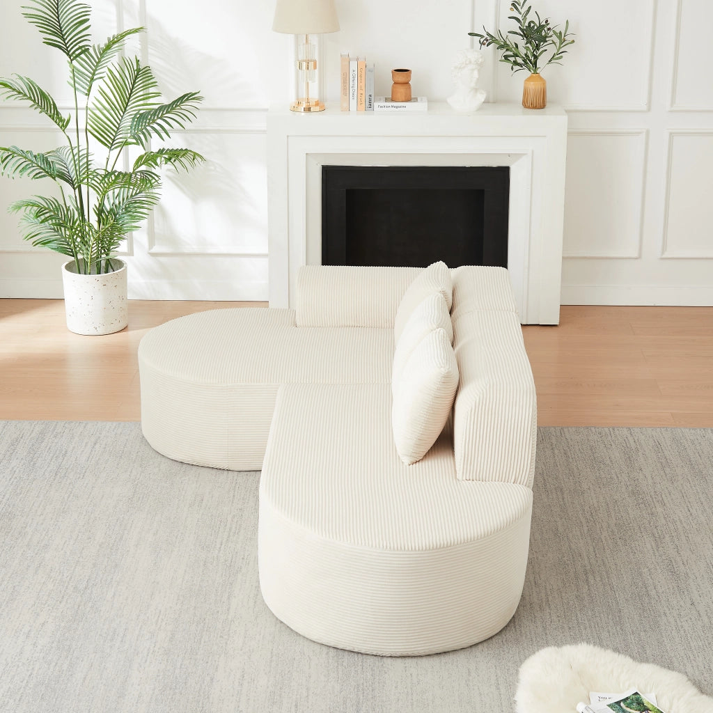 Divano modulare a L in velluto a coste beige con chaise longue curva; 220 cm