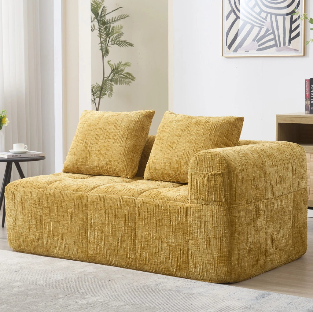 Divano 2 posti in tessuto chenille giallo con chaise longue, cuscino incluso e tasche laterali