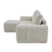 Divano angolare modulare con design segmentato e supporto in velluto a coste beige