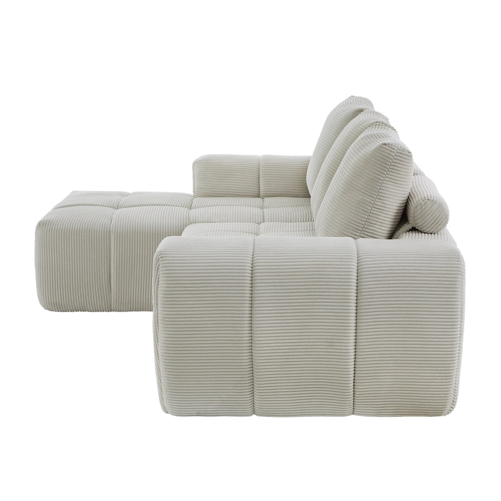 Divano angolare modulare con design segmentato e supporto in velluto a coste beige