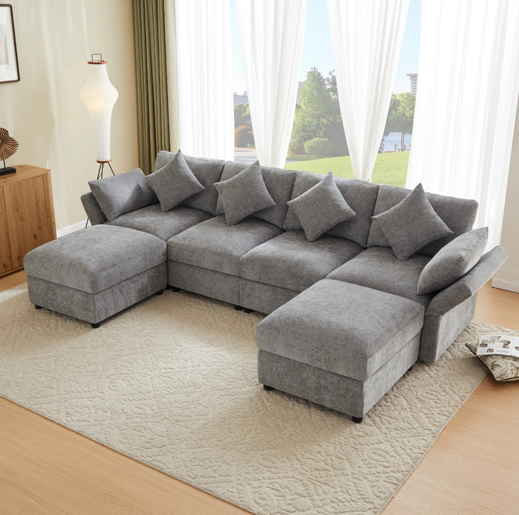 Divano modulare angolare 284x156;5x86 cm in chenille grigio con 2 pouf e 6 cuscini