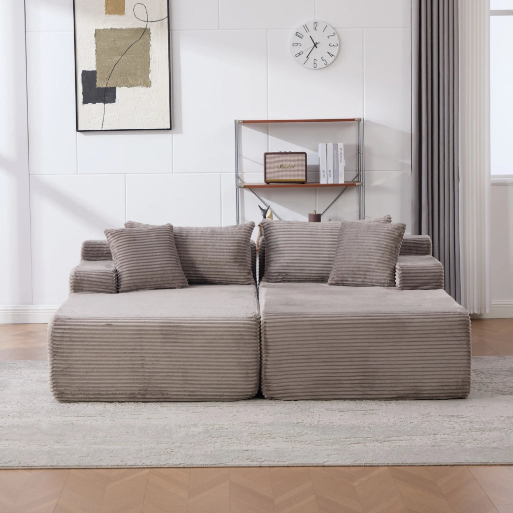 Divano con chaise longue e cuscino in ciniglia grigio